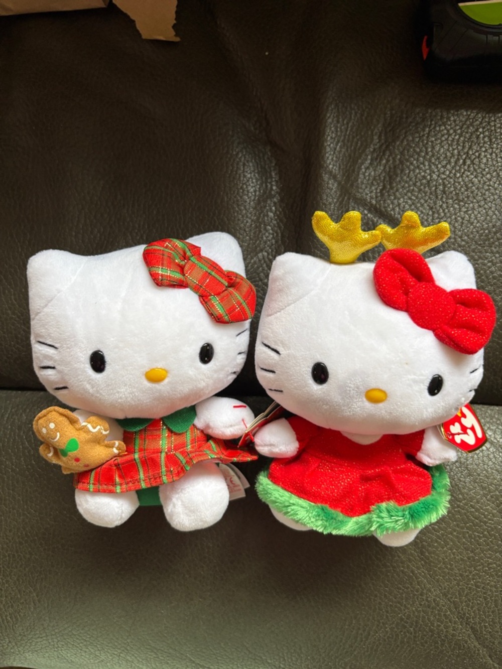 Hello kitty two winter holiday beanie baby’s in plaid gingerbread and reindeer